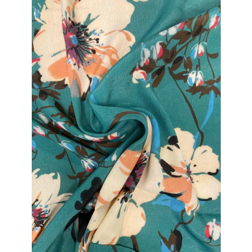 Tissus polyester fleurs fond vert