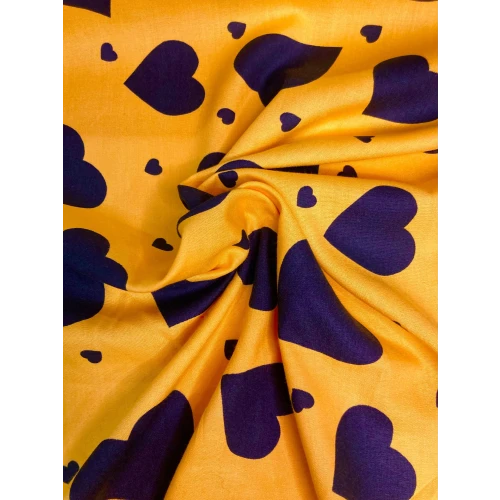 Coton fond jaune coeur noir